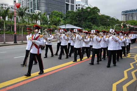 SINGAPORE - DECEMBER 07: Singapore Armed Forces Band B marching during President's changing of guards parade December 07, 2008 in Singaporeのeditorial素材