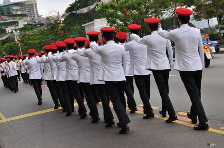 SINGAPORE - DECEMBER 07: Singapore Armed Forces contingent marching on public road during President's changing of guards parade December 07, 2008 in Singaporeのeditorial素材