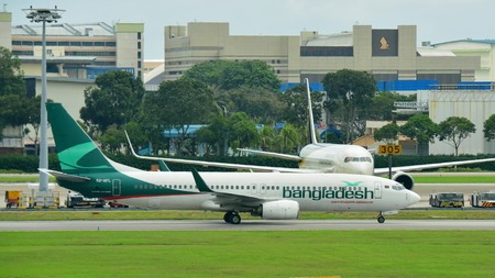 SINGAPORE - JANUARY 10: Biman Bangladesh Airlines Boeing 737-800 taxiing at Changi Airport on...