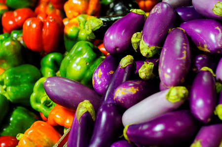 Fresh eggplants and peppersの写真素材