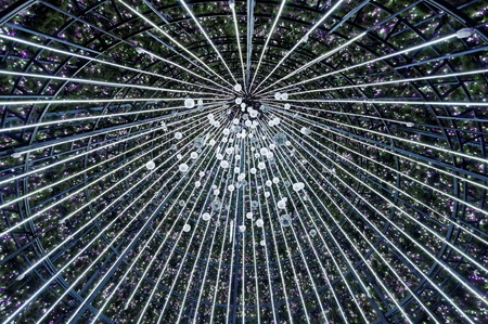 Convergence of white lights inside Christmas treeの写真素材
