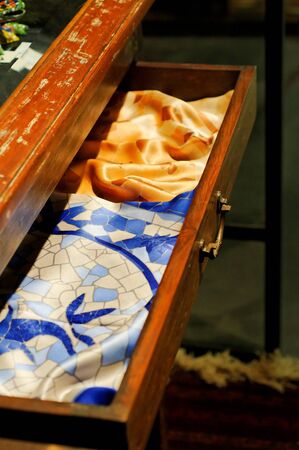 Silk scarfs in an old drawerの写真素材