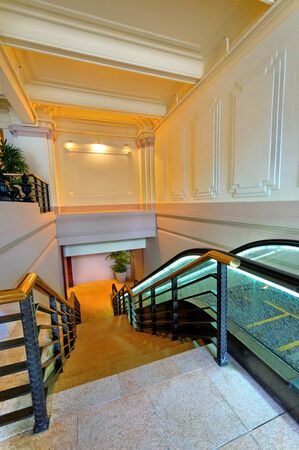 Stairway and escalator to basement in an office building