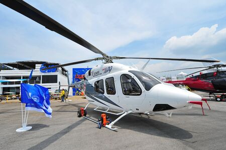SINGAPORE - FEBRUARY 9: Bell 429 GlobalRanger helicopter on display at Singapore Airshow February 9, 2014 in Singaporeのeditorial素材