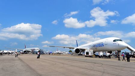 SINGAPORE - FEBRUARY 12: Competition between Boeing 787-8 Dreamliner and Airbus A350-900 XWB at Singapore Airshow February 12, 2014 in Singaporeのeditorial素材