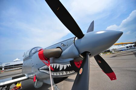 SINGAPORE - FEBRUARY 9: Beechcraft AT-6 Texan II light attack single turboprop plane on display at...
