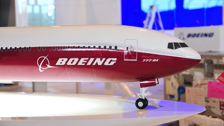 SINGAPORE - FEBRUARY 9: Model of Boeing 777-9X on display at Singapore Airshow February 9, 2014 in Singaporeのeditorial素材