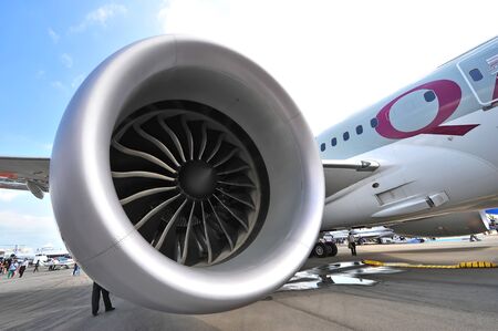 SINGAPORE - FEBRUARY 12: General Electric GEnx engine powering the Qatar Airways Boeing 787-8 Dreamliner at Singapore Airshow February 12, 2014 in Singaporeのeditorial素材