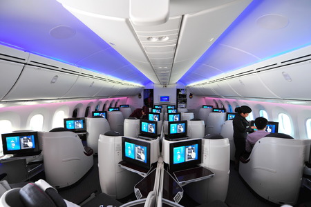 SINGAPORE - FEBRUARY 12: Luxurious and spacious business class seats in a Qatar Airways Boeing 787-8 Dreamliner at Singapore Airshow February 12, 2014 in Singaporeのeditorial素材
