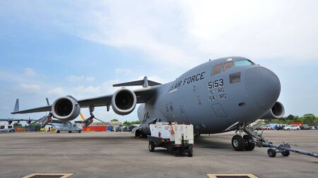 SINGAPORE - FEBRUARY 9: USAF Boeing C-17 Globemaster III large military transport aircraft on...