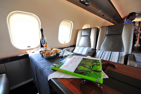 SINGAPORE - FEBRUARY 12: Luxurious interior of Bombardier Global 6000 business jet at Singapore Airshow February 12, 2014 in Singaporeのeditorial素材
