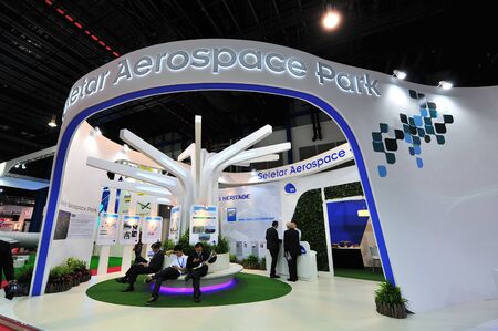 SINGAPORE - FEBRUARY 12: Seletar Aerospace Park booth showcasing airport developments at Singapore...