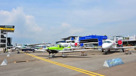 SINGAPORE - FEBRUARY 9: Various Cessna aircraft on display at Singapore Airshow February 9, 2014 in Singaporeのeditorial素材