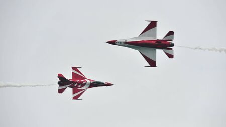 SINGAPORE - FEBRUARY 12: Republic of Singapore Air Force (RSAF) Black Knights performing aerobatics...