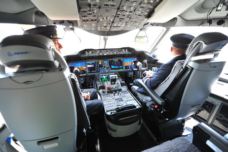 SINGAPORE - FEBRUARY 12: Modern cockpit of Qatar Airways Boeing 787-8 Dreamliner at Singapore Airshow February 12, 2014 in Singaporeのeditorial素材