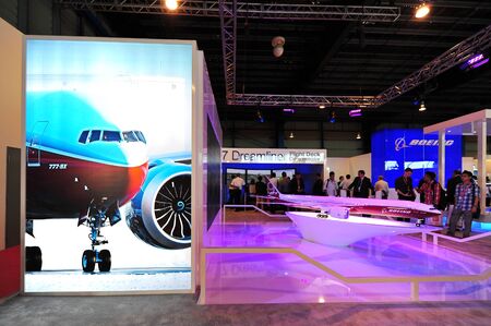 SINGAPORE - FEBRUARY 12: Boeing 777-9X model on display at Singapore Airshow February 12, 2014 in Singaporeのeditorial素材
