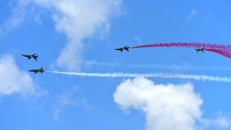 SINGAPORE - FEBRUARY 16:  RKAF Black Eagles Aerobatic Team aerobatic performance at Singapore Airshow February 16, 2016 in Singaporeのeditorial素材