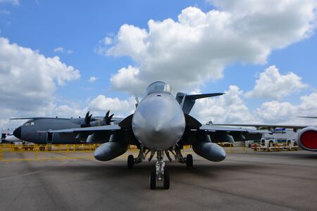 SINGAPORE - FEBRUARY 16:  US Navy Boeing F/A-18E/F Super Hornet fighter on display at Singapore Airshow February 16, 2016 in Singaporeのeditorial素材