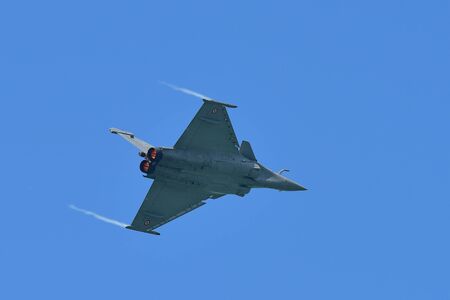 SINGAPORE - FEBRUARY 16:  French Air Force Rafale performing aerobatics at Singapore Airshow...