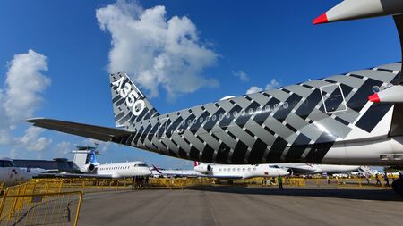 SINGAPORE - FEBRUARY 16:  Airbus A350-900 XWB in carbon livery on display at Singapore Airshow February 16, 2016 in Singaporeのeditorial素材