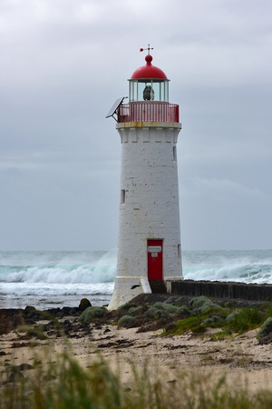 Port Fairy LIghthouse on Griffiths Island, Victoria, Australiaの写真素材