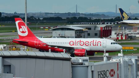 SINGAPORE - DECEMBER 23: Air Berlin Airbus A320 taxiing at Changi Airport on December 23, 2016 in Singaporeのeditorial素材