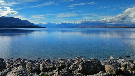 Lake Pukaki with Mount Cook and mountain ranges in the background, in Canterbury, New Zealandの写真素材
