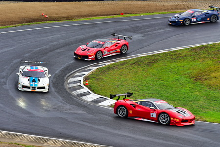 HAMPTON DOWNS, NEW ZEALAND - APRIL 18: Ferrari 488 Challenge cars racing at Ferrari Challenge Asia Pacific Series race on April 15, 2018 in Hampton Downsのeditorial素材