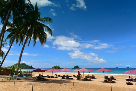 PInk umbrellas at Nacpan Beach, one of the most beautiful beaches in El Nido, Palawan Island, Philippinesのeditorial素材