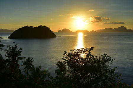 Beautiful sunset at Las Cabanas Beach at El Nido, Philippines