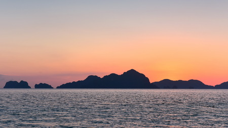 Spectacular sunset as viewed from Seven Commandos Beach at El Nido, Philippinesの写真素材
