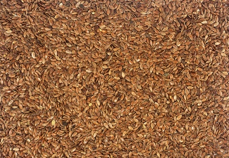  closeup of healthy omega 3 filled flax seeds backgroundの写真素材