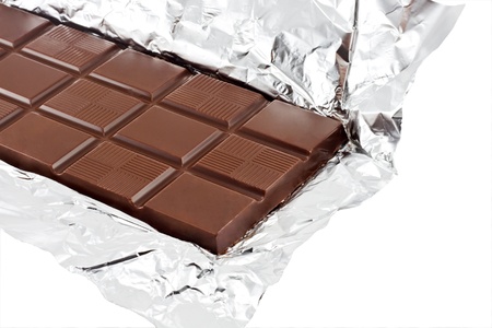 chocolate on a foil on a white background is isolated 
の写真素材