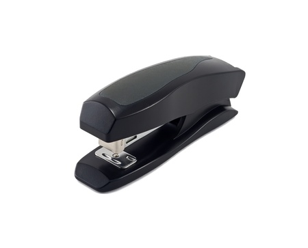 Office stapler isolated on white and some cramps nearの写真素材
