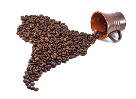 coffee beans shaped like south america and brown cupsの写真素材