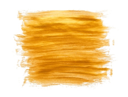Gold acrylic paint brush strokes on white backgroundの写真素材