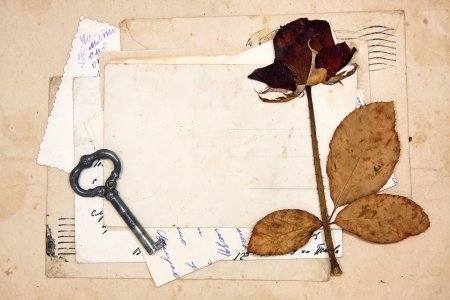 old letters, empty post cards and dried rose, vintage backgroundの写真素材