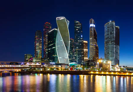 Office and residential skyscrapers against the sunset sky. Modern business district of the city.の写真素材