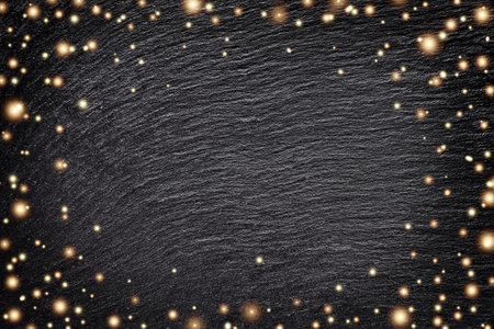 Dark Christmas background with golden snowflakes and stars. Dark gray black background with Christmas stars. Christmas black stone background. top view. Free copy space.の写真素材