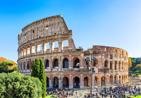 Colosseum (Coliseum) is one of main travel attraction of Rome, Italy. Ancient Roman ruins of Colosseum, landscape of old Rome city, Italy.の写真素材