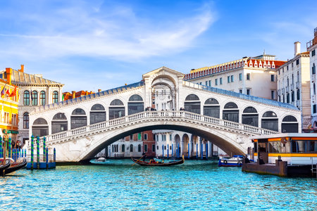 View of Grand Canal with Rialto Bridge in Venice, Italy. Landscape with Rialto Bridge and gondola on the Grand Canal in Venice, Italy, Europe.の写真素材