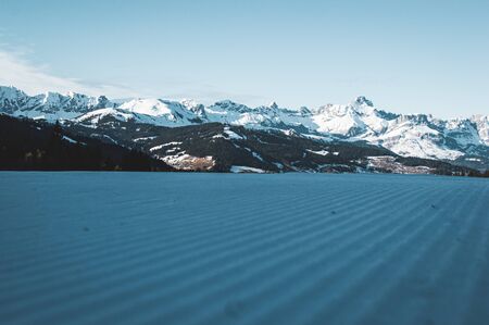 Beautiful day in French alps near small town called Megeve. Winter time in france, snow on...
