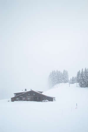 Beautiful day in French alps near small town called Megeve. Winter time in france, snow on mountains, beautiful scenic view.のeditorial素材