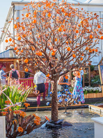 LONDON, UK - MAY 25, 2017: RHS Chelsea Flower Show 2017. Sculptured garden fountain trees.のeditorial素材