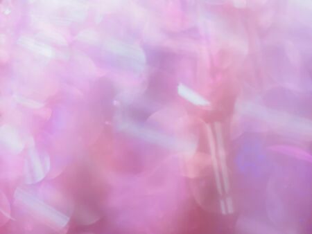 Abstract soft-focused glittering and shiny bokeh background.の写真素材