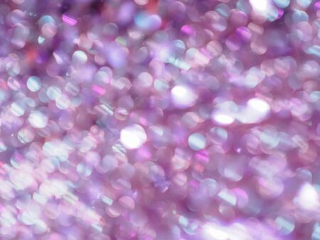 Abstract soft-focused glittering and shiny bokeh background.の写真素材