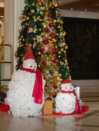 snowman and christmas treeの写真素材
