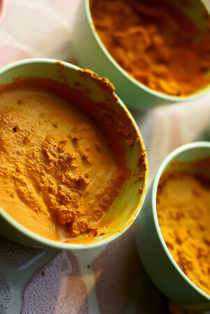 This is a turmeric. It is an herb. In thailand we use it to scrub.Turmeric powder is used extensively in South Asian cuisine.Some time use for ceremony to monk.の写真素材