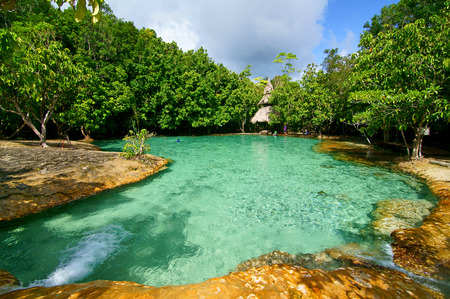 This is Emerald Pool. This hot spring originates from a warm stream in the lowland forest of Khao Nor Juji which is supposedly Thailandの写真素材