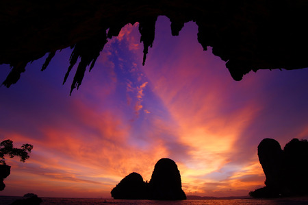 This is a sunset time at Ao Tham Phra Nang Beach.の写真素材